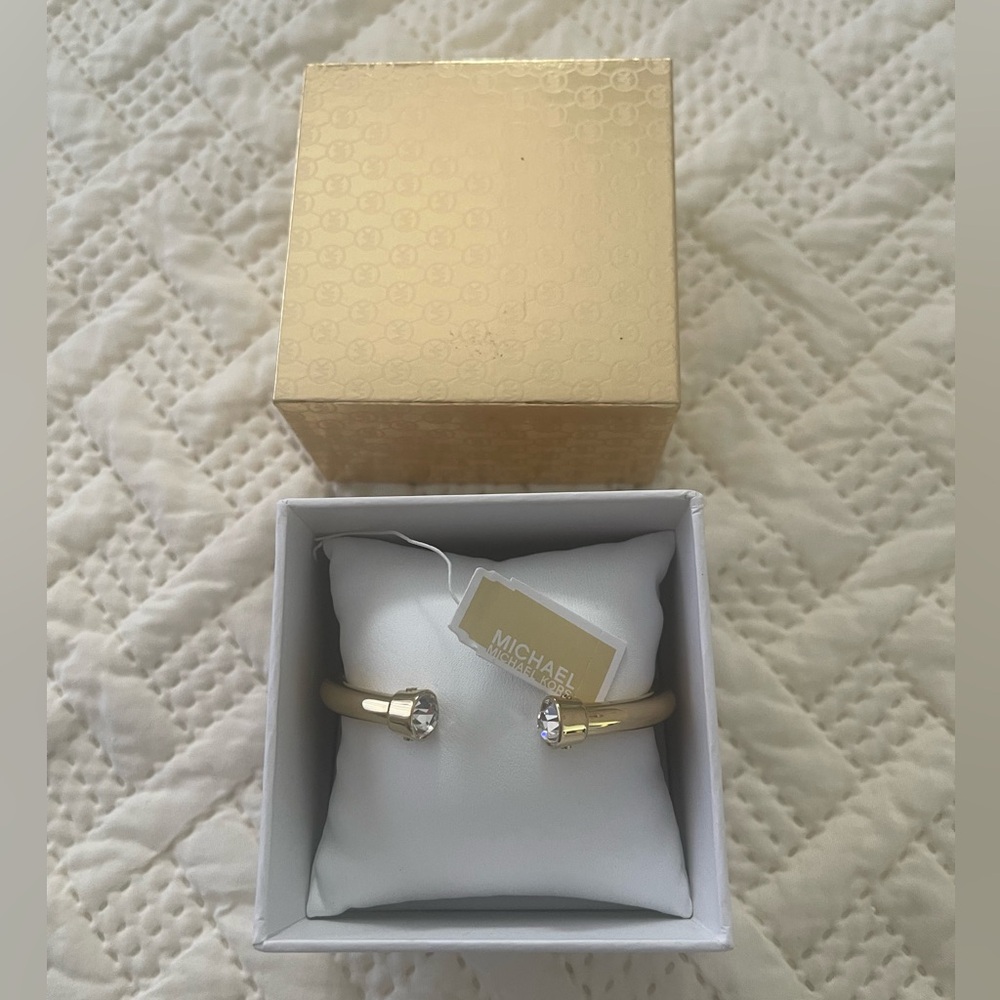 SOLD IN ANOTHER PLATFORM Michael Kors Gold Cuff Bracelet with Crystal Ends